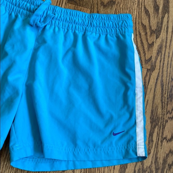 Bright turquoise with white side stripe Nike shorts with pockets, size women’s L - Picture 9 of 16